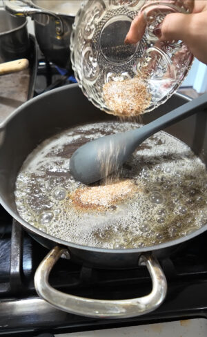 melted butter and seasonings in pan